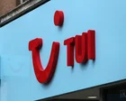 Logotipo de Tui sobre fondo azul